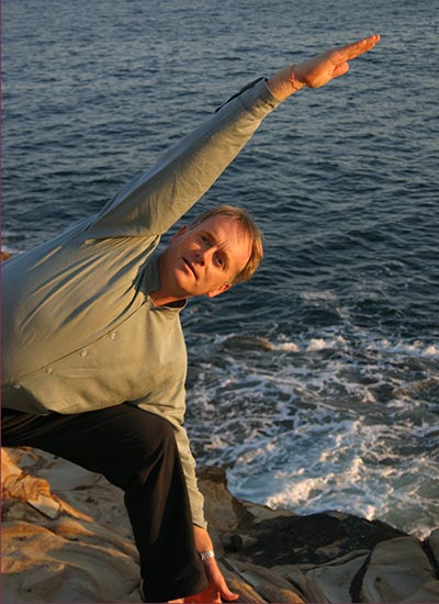 Dru yoga - bhima posture by the beach