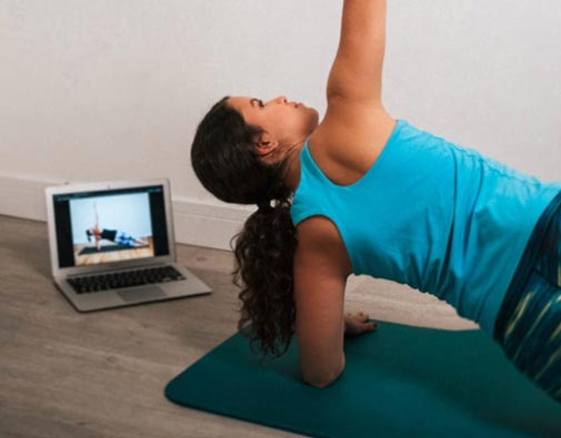 Isabella strong yoga with computer